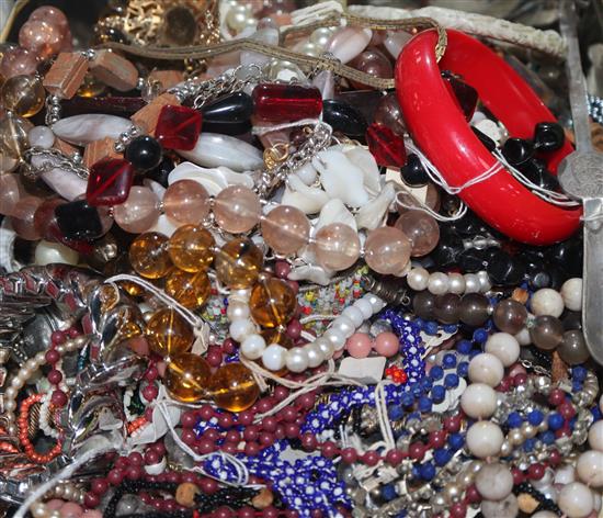 Mixed costume jewellery including necklaces.